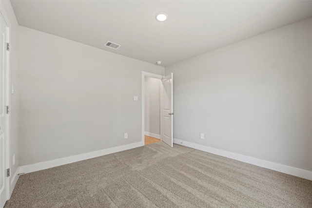 2845 14th St, Hempstead, TX 77445 - spare room featuring baseboards and light colored carpet