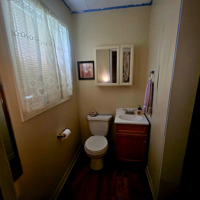 710 College St, El Campo, TX 77437 - bathroom with vanity and wood finished floors