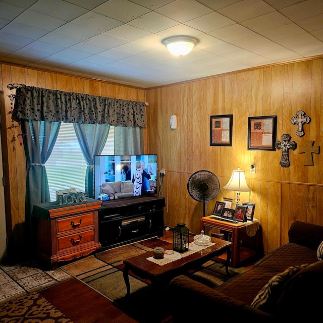 710 College St, El Campo, TX 77437 - living room with wooden walls and wood finished floors