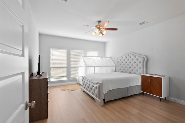13746 Brahman Valley Ct, Cypress, TX 77429 - bedroom featuring light wood-type flooring and a ceiling fan