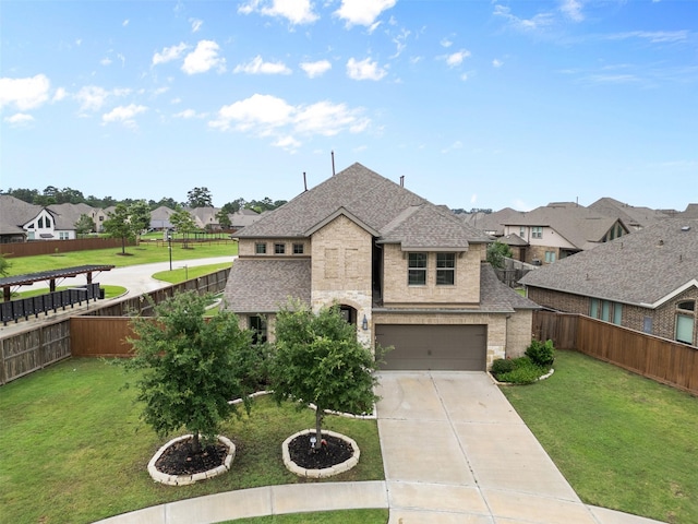 13746 Brahman Valley Ct, Cypress, TX 77429 - french provincial home featuring a residential view, concrete driveway, roof with shingles, and stone siding