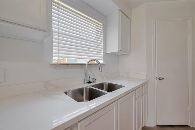 6219 Canada Dr, Pasadena, TX 77505 - kitchen with a sink and white cabinets