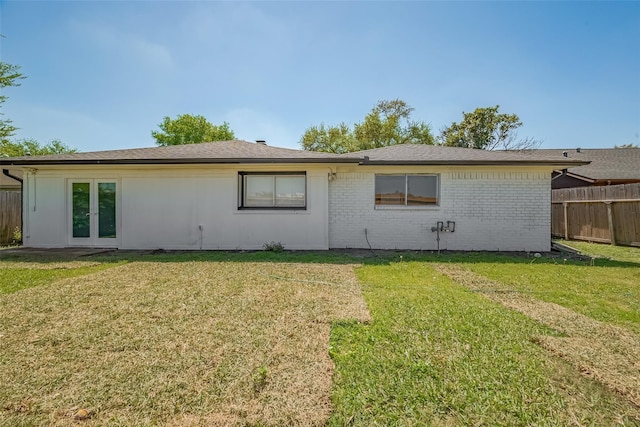 6219 Canada Dr, Pasadena, TX 77505 - rear view of property featuring brick siding and french doors