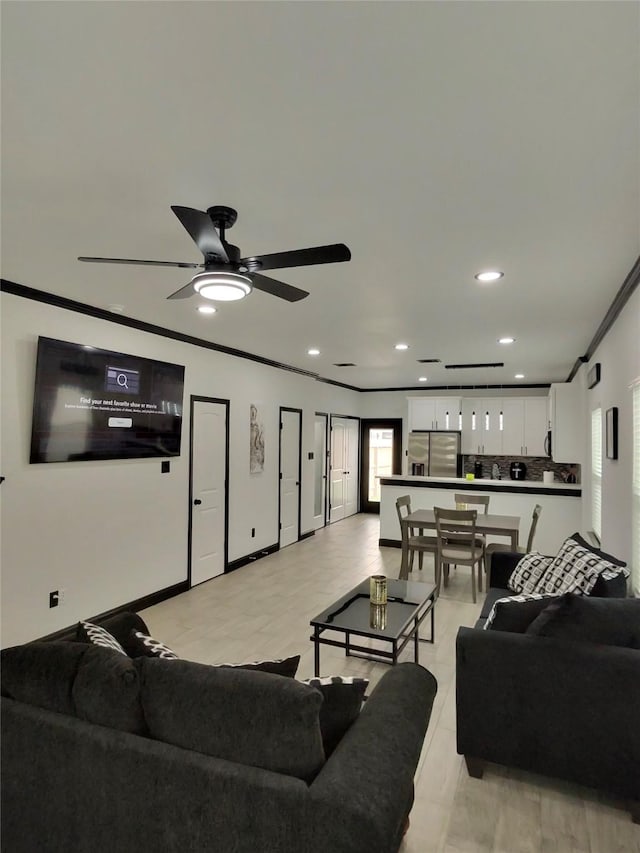 4739 Reed Rd Unit A, Houston, TX 77033 - living room with ornamental molding, recessed lighting, and ceiling fan