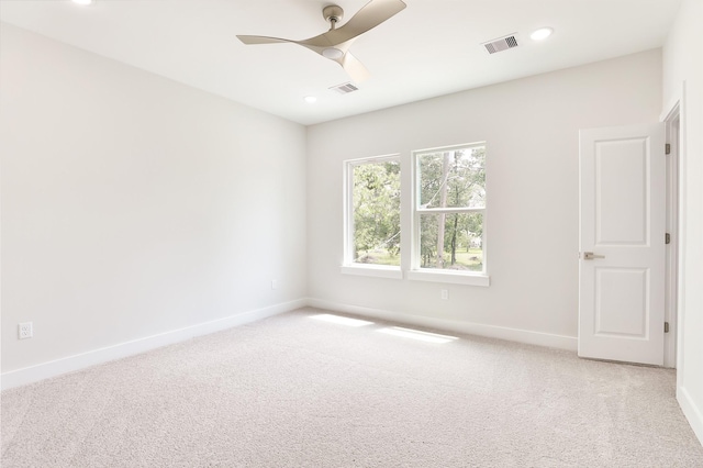 6909 S Hall St, Houston, TX 77028 - carpeted spare room with ceiling fan and recessed lighting
