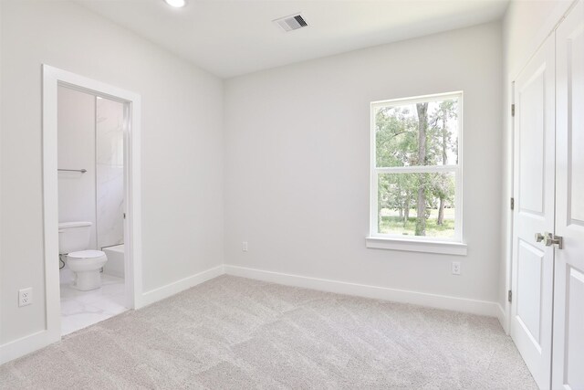 6909 S Hall St, Houston, TX 77028 - unfurnished bedroom with carpet, ensuite bath, and recessed lighting