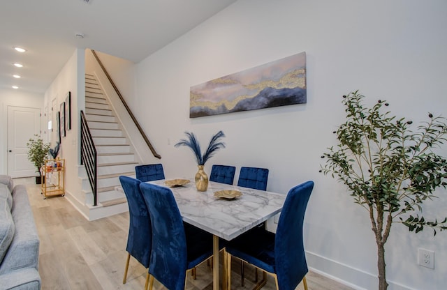 1616 Benson St, Houston, TX 77020 - dining area with light wood-style floors, recessed lighting, and stairs