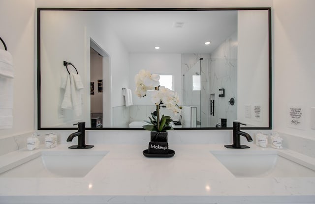 1616 Benson St, Houston, TX 77020 - bathroom view of a marble finish shower, double vanity, and recessed lighting