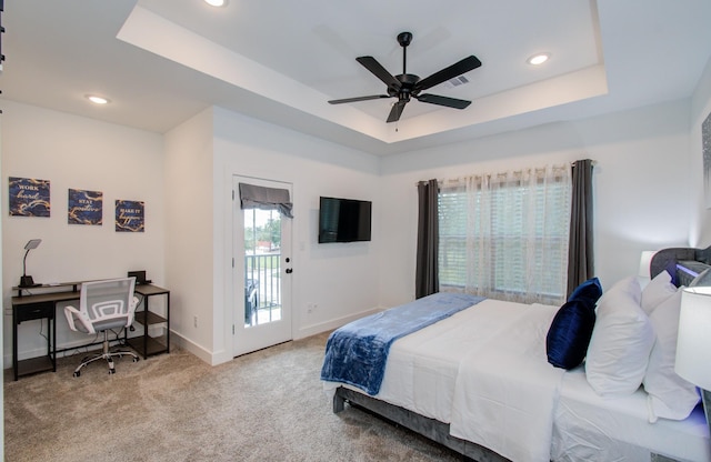 1616 Benson St, Houston, TX 77020 - bedroom with a tray ceiling, carpet, access to outside, recessed lighting, and ceiling fan