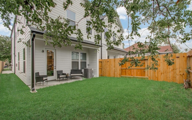 1616 Benson St, Houston, TX 77020 - rear view of property with a fenced backyard and a patio