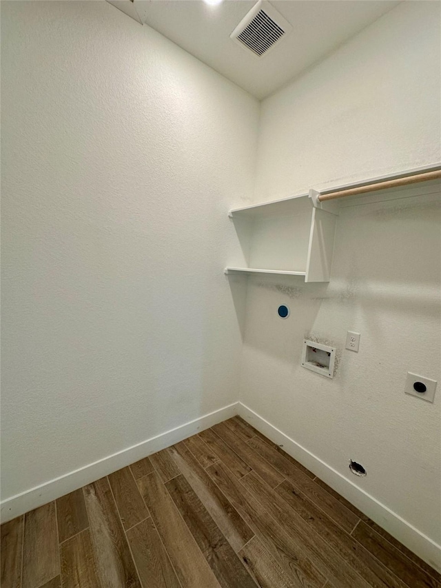 16446 Elk Meadow Dr, Conroe, TX 77302 - laundry room with electric dryer hookup, dark wood-type flooring, and washer hookup