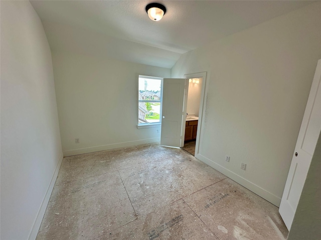 16446 Elk Meadow Dr, Conroe, TX 77302 - unfurnished bedroom featuring lofted ceiling and connected bathroom