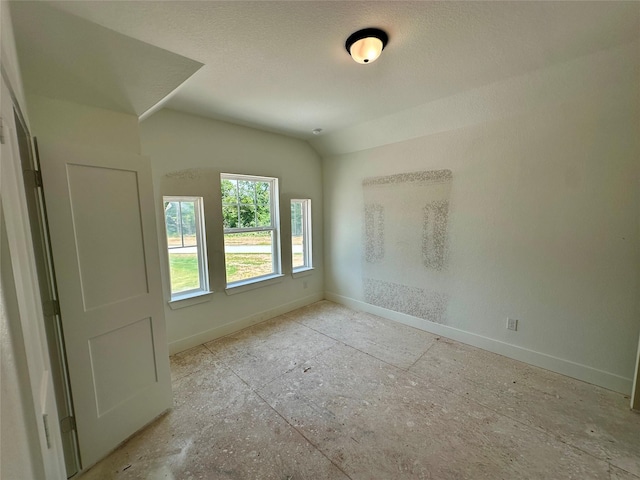 16446 Elk Meadow Dr, Conroe, TX 77302 - unfurnished room with baseboards and vaulted ceiling