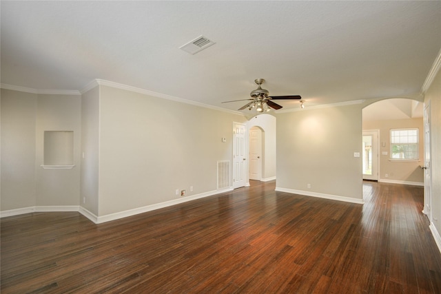238 Horse Shoe Trl, Angleton, TX 77515 - spare room featuring arched walkways, ceiling fan, dark wood-style flooring, and crown molding