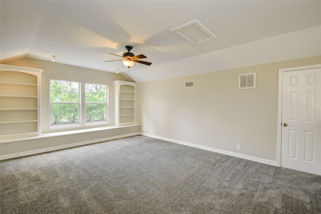 238 Horse Shoe Trl, Angleton, TX 77515 - unfurnished room featuring lofted ceiling, carpet flooring, a ceiling fan, built in shelves, and attic access