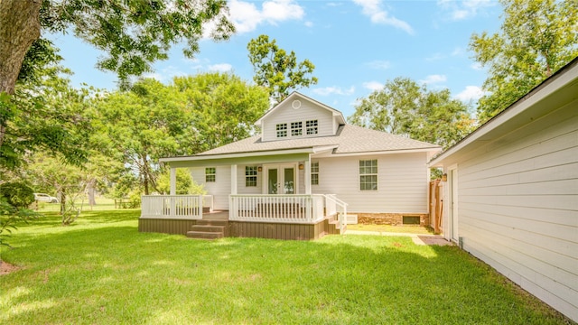 238 Horse Shoe Trl, Angleton, TX 77515 - rear view of house with french doors, a lawn, roof with shingles, and a deck