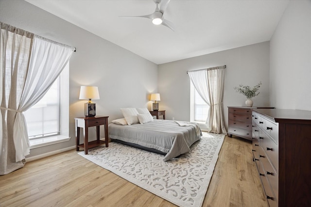 2475 Underwood St Unit 369, Houston, TX 77030 - bedroom featuring light wood-style flooring and a ceiling fan