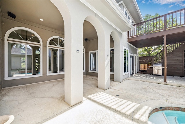 966 Bentwater Dr, Montgomery, TX 77356 - view of patio featuring stairway and grilling area