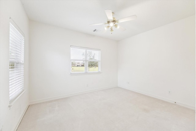 966 Bentwater Dr, Montgomery, TX 77356 - empty room featuring light carpet and ceiling fan