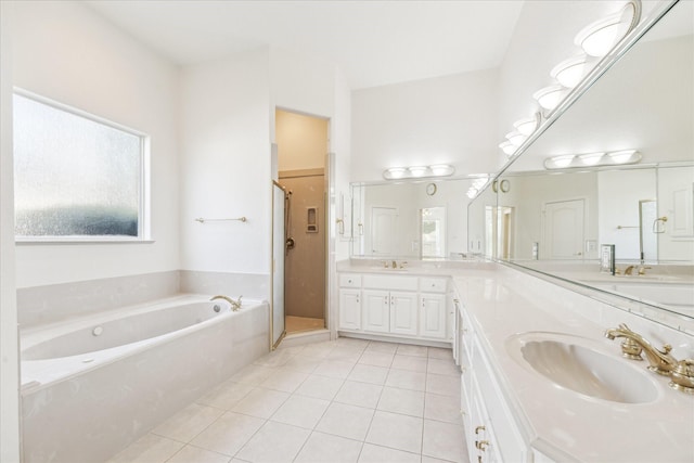 966 Bentwater Dr, Montgomery, TX 77356 - bathroom featuring a garden tub, a shower stall, tile patterned floors, and plenty of natural light