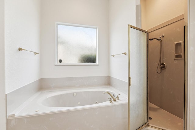 966 Bentwater Dr, Montgomery, TX 77356 - bathroom featuring a shower stall and a tub with jets