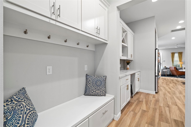 344 W 27th St, Houston, TX 77008 - mudroom featuring light wood-style floors and recessed lighting