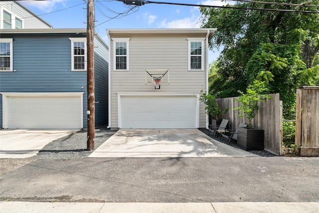 344 W 27th St, Houston, TX 77008 - view of front of property featuring a garage and driveway