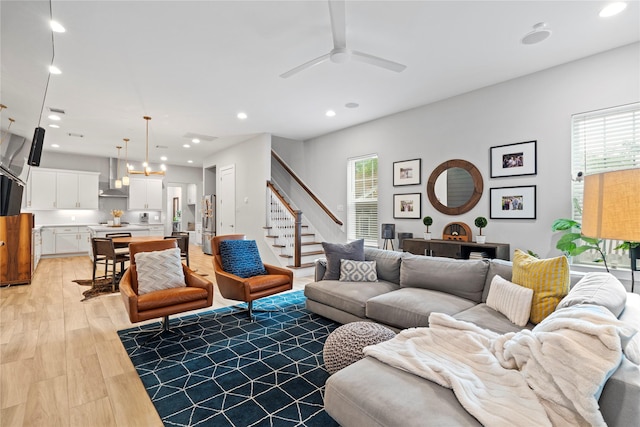 344 W 27th St, Houston, TX 77008 - living room with light wood-style floors, a ceiling fan, stairway, and recessed lighting
