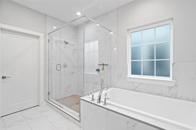 344 W 27th St, Houston, TX 77008 - full bath featuring a garden tub, marble finish floors, and a marble finish shower