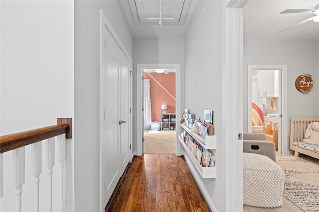 344 W 27th St, Houston, TX 77008 - hallway featuring attic access and wood finished floors