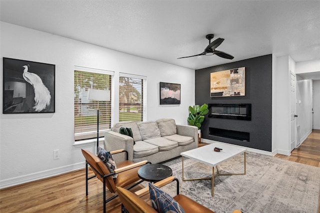 3404 Rosedale St, Houston, TX 77004 - living room with wood finished floors and a ceiling fan