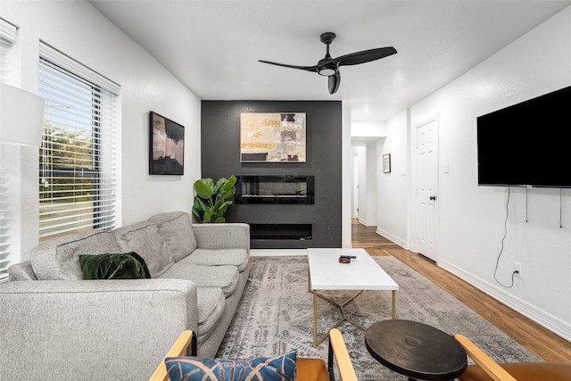 3404 Rosedale St, Houston, TX 77004 - living area featuring wood finished floors and a ceiling fan