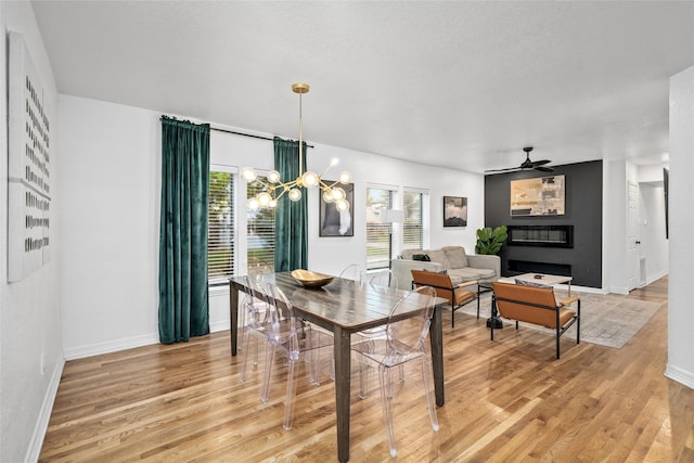 3404 Rosedale St, Houston, TX 77004 - dining room featuring light wood finished floors, plenty of natural light, and a ceiling fan