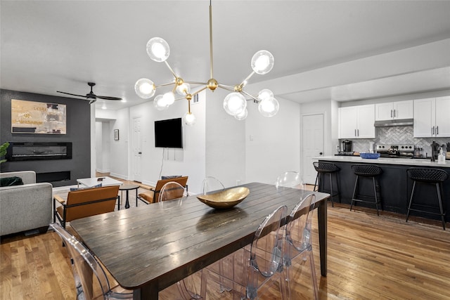 3404 Rosedale St, Houston, TX 77004 - dining space featuring light wood finished floors and a ceiling fan