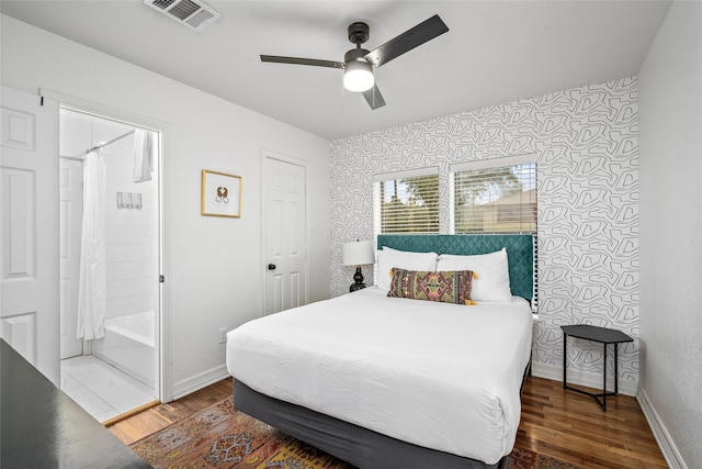 3404 Rosedale St, Houston, TX 77004 - bedroom with wood finished floors, wallpapered walls, and ceiling fan