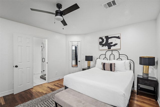 3404 Rosedale St, Houston, TX 77004 - bedroom with wood finished floors, ceiling fan, and connected bathroom