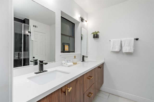 3404 Rosedale St, Houston, TX 77004 - full bathroom featuring double vanity and tile patterned flooring