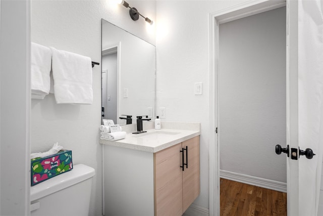 3404 Rosedale St, Houston, TX 77004 - half bath with vanity and wood finished floors