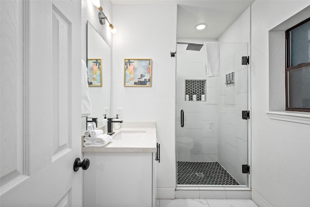 3404 Rosedale St, Houston, TX 77004 - full bath featuring vanity, a stall shower, and marble look tiles