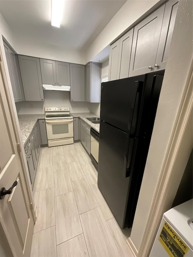 3100 Walnut Bend Ln Unit 113, Houston, TX 77042 - kitchen with electric stove, gray cabinetry, freestanding refrigerator, under cabinet range hood, and dishwashing machine