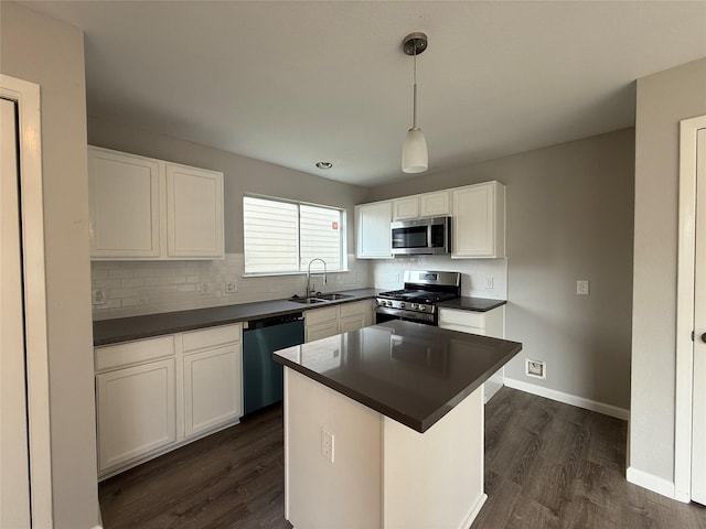 1091 Verde Trails Dr, Houston, TX 77073 - kitchen with appliances with stainless steel finishes, dark countertops, decorative backsplash, and white cabinets