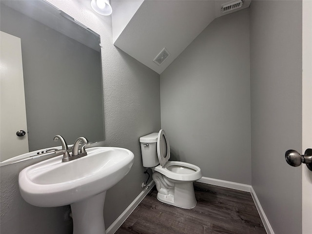 1091 Verde Trails Dr, Houston, TX 77073 - bathroom featuring toilet and wood finished floors