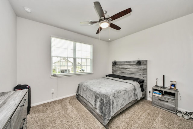 3923 Calasso Ct, Katy, TX 77493 - carpeted bedroom featuring baseboards and a ceiling fan