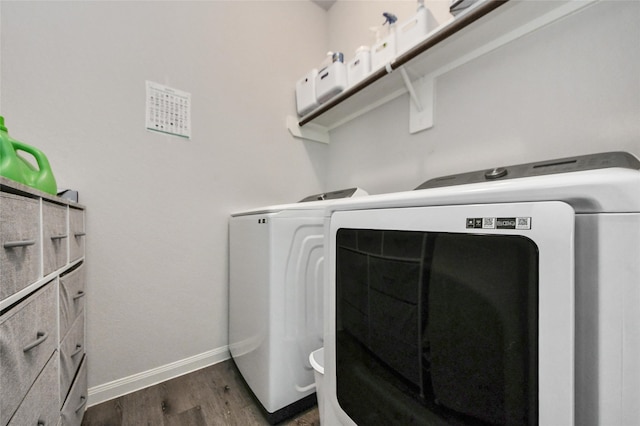 3923 Calasso Ct, Katy, TX 77493 - laundry area featuring washer and dryer and dark wood finished floors