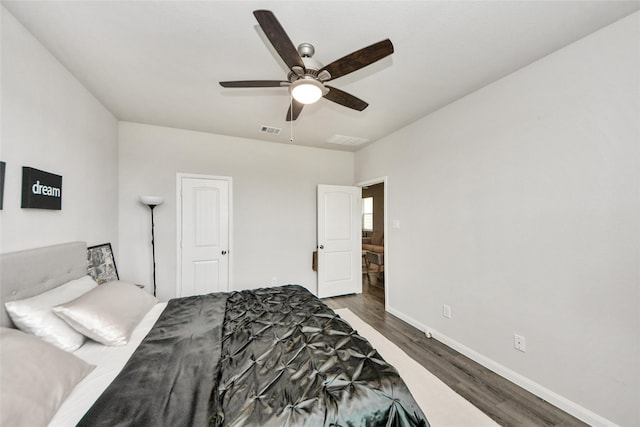 3923 Calasso Ct, Katy, TX 77493 - bedroom with wood finished floors and a ceiling fan