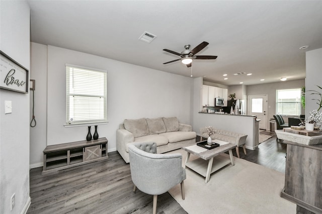 3923 Calasso Ct, Katy, TX 77493 - living room featuring wood finished floors, ceiling fan, and recessed lighting