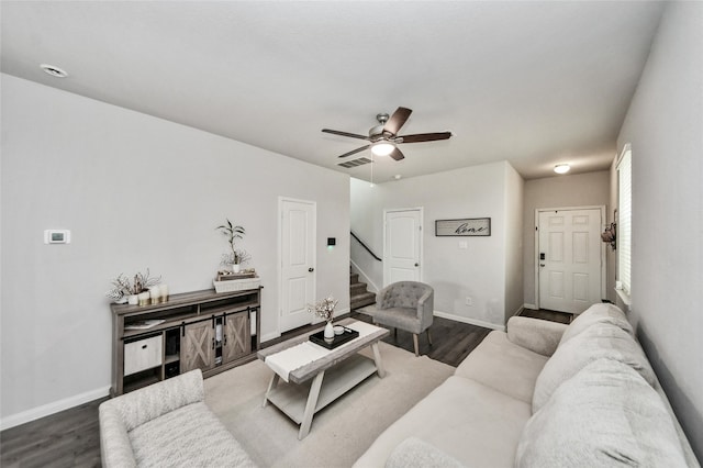3923 Calasso Ct, Katy, TX 77493 - living room with stairs, dark wood-style floors, and ceiling fan