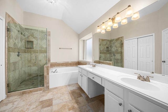 17130 Mountain Crest Dr, Spring, TX 77379 - full bathroom with vaulted ceiling, double vanity, a garden tub, and a shower stall