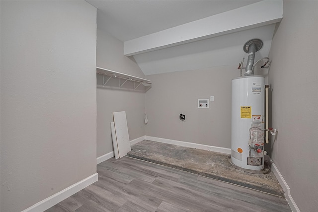 11502 Leader St, Houston, TX 77072 - laundry room with gas water heater, electric dryer hookup, washer hookup, and wood finished floors