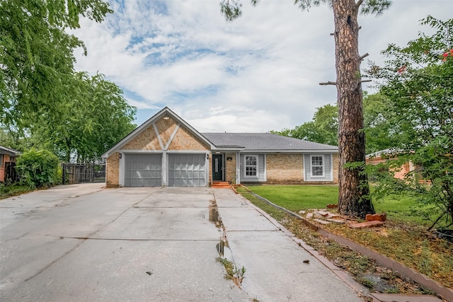 11502 Leader St, Houston, TX 77072 - single story home with a garage, concrete driveway, and brick siding